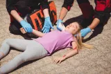 paramedics-examining-injured-girl84987.jpg